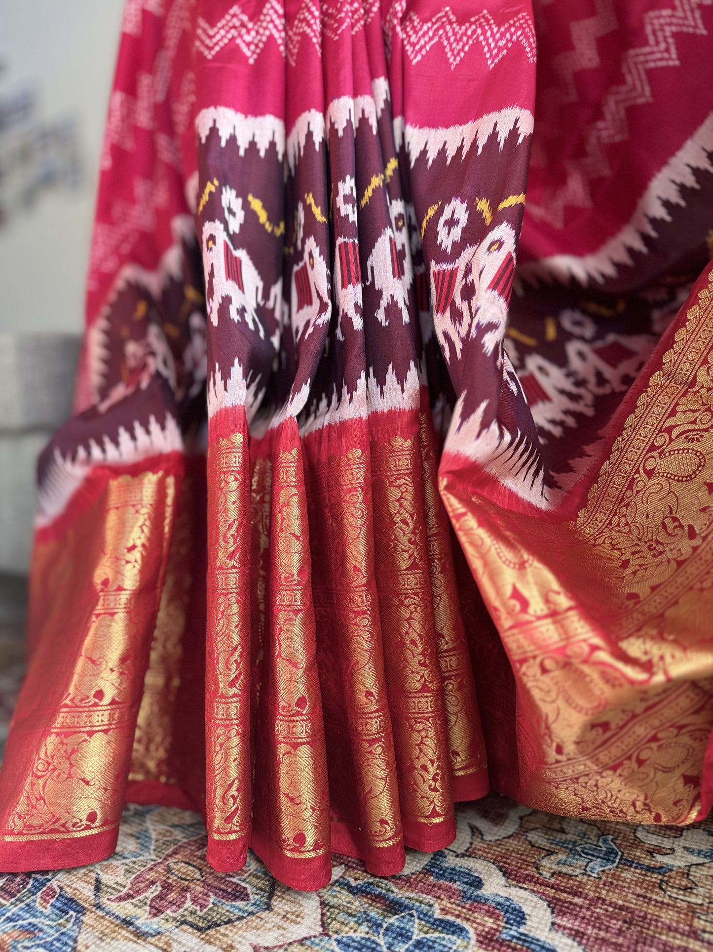 Pink ikkath Patola with Red Kanchi Border.