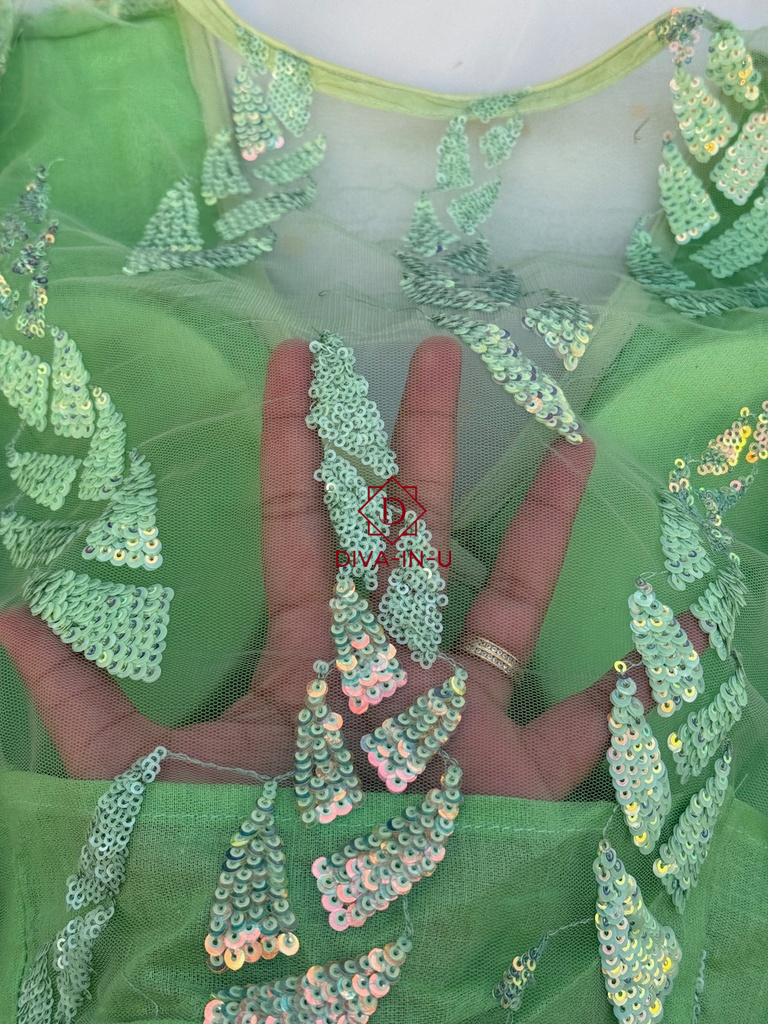 Radiant Glow: The Fluorescent Green Shimmer Blouse