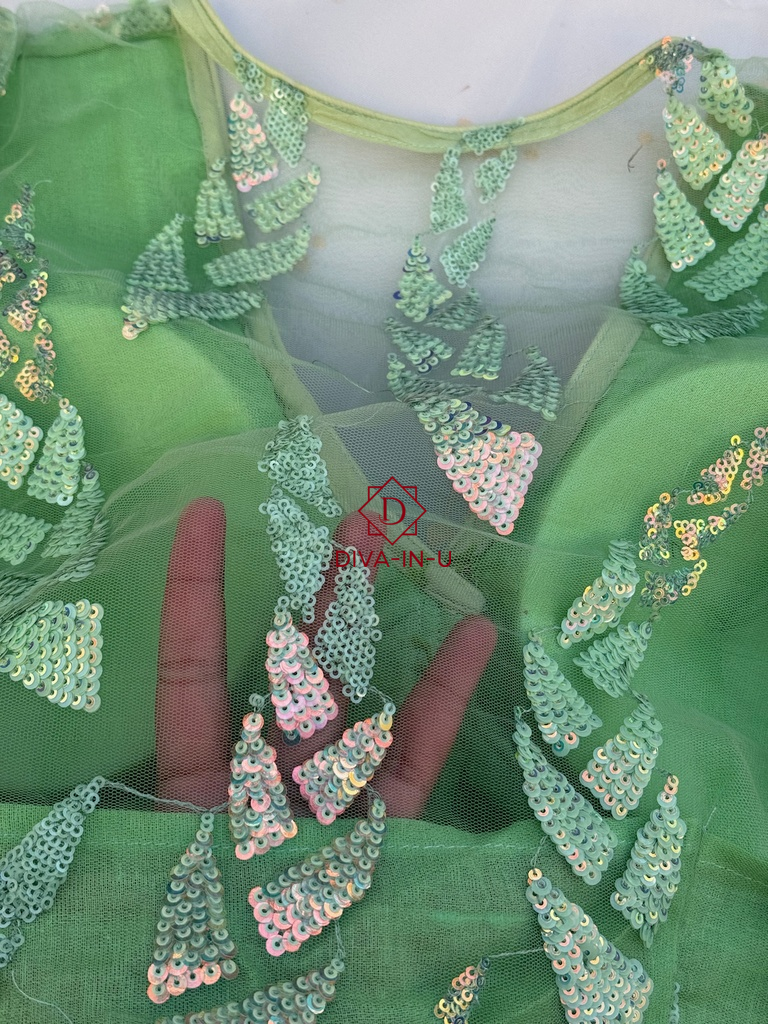 Radiant Glow: The Fluorescent Green Shimmer Blouse