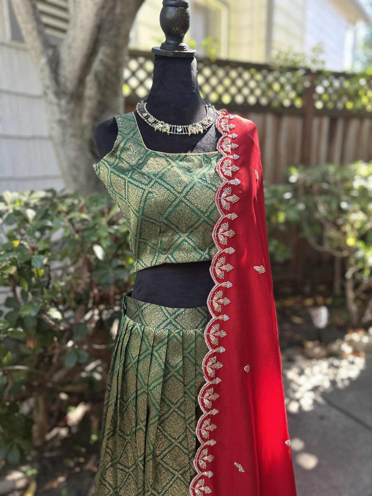 Parrot Green Lehanga with Red Dharmavaram Border and trendy Stitched blouses.