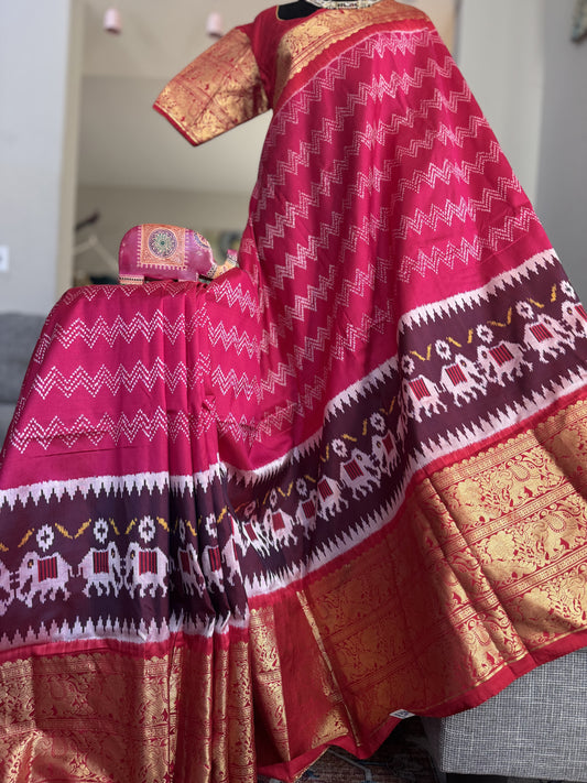 Pink ikkath Patola with Red Kanchi Border.